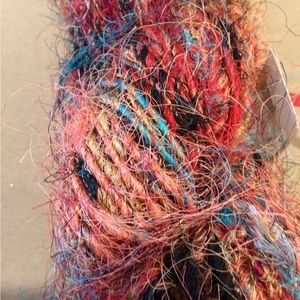 YARN Sari silk imported by Munch yarns. 100% recycled silk spun in Nepal